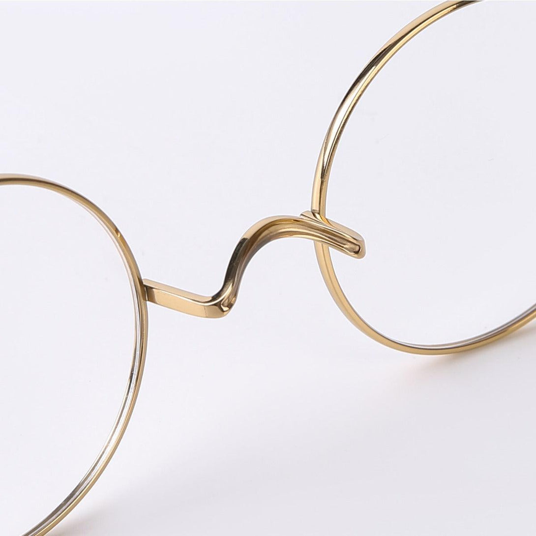 Round Wire Rimmed Glasses | Titanium Frame Saddle Bridge A185725 - AGSTUM OPTICAL